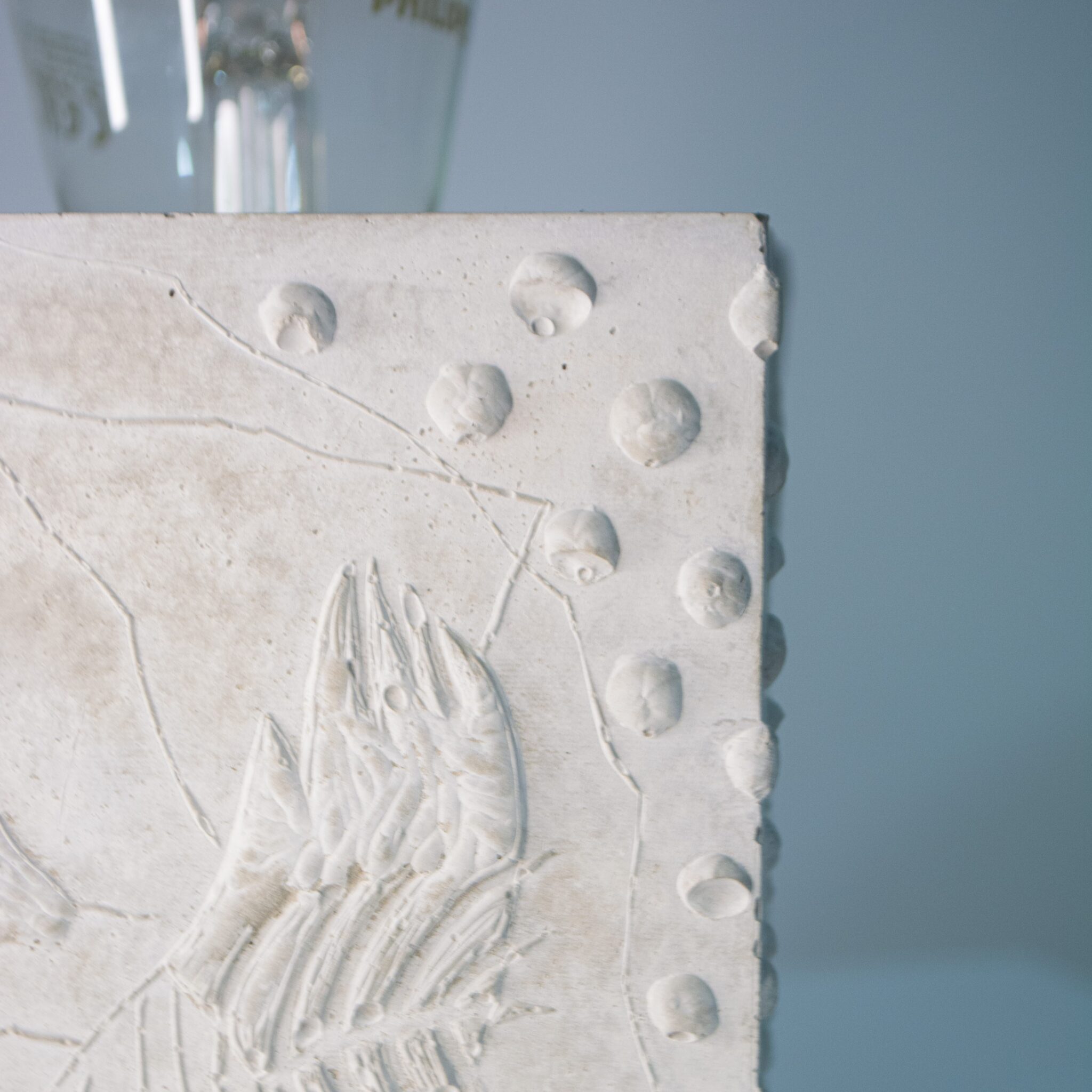 Seasons collection concrete lamp with artsy relief design