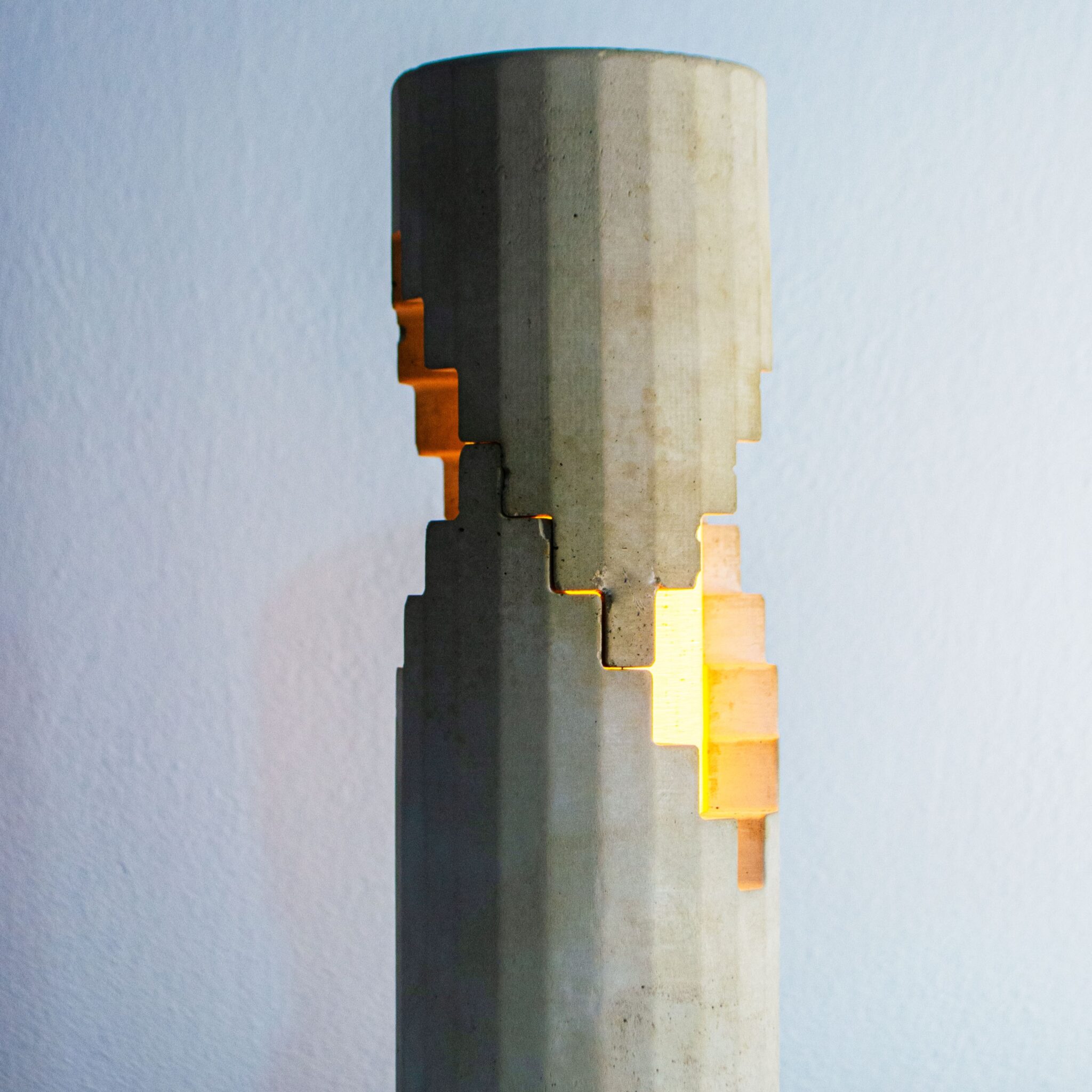 Concrete design interactive lamp from studio monstro. Scalae interactive lamp made out of concrete